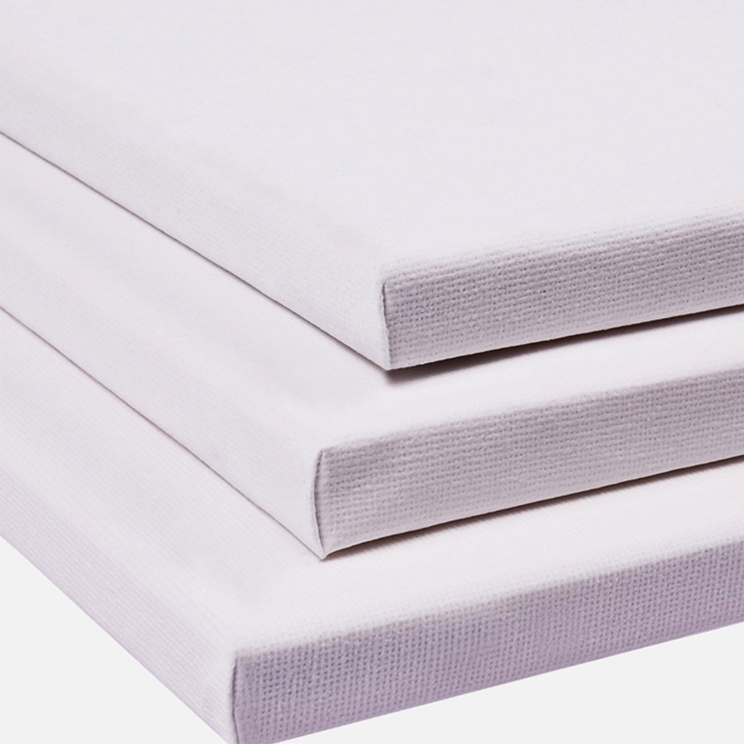 Five blank artist stretched canvases on a white background, ideal for oil and acrylic painting.