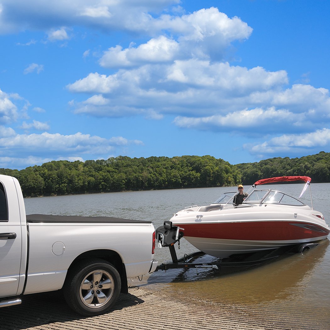 6500 LBS Electric Boat Trailer Winch with remote control and high-tensile steel cable, designed for easy boat towing.