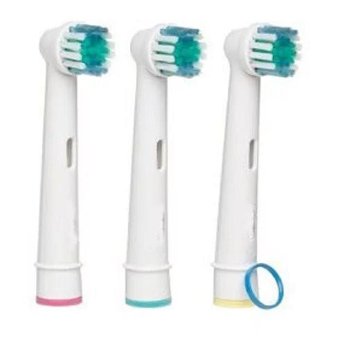 Eight replacement brush heads for Oral B electric toothbrush, featuring multi-level bristles and soft Dupont Tynex fibers for effective cleaning.