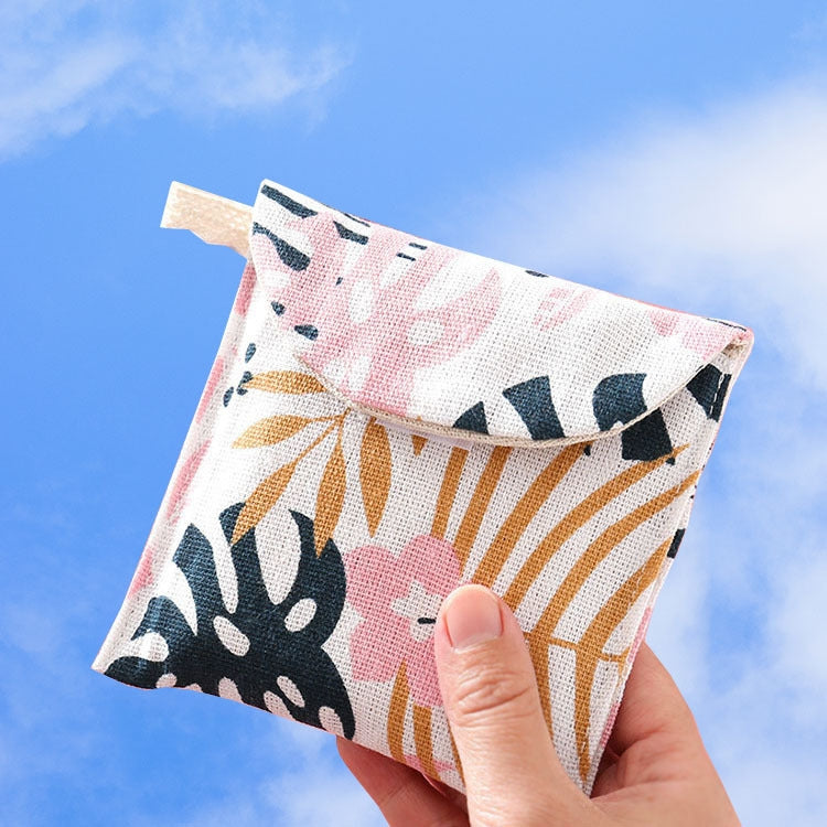 8pcs Cotton and Linen Sanitary Napkin Storage Bag featuring fun cartoon patterns and a lightweight design, perfect for storing small items.