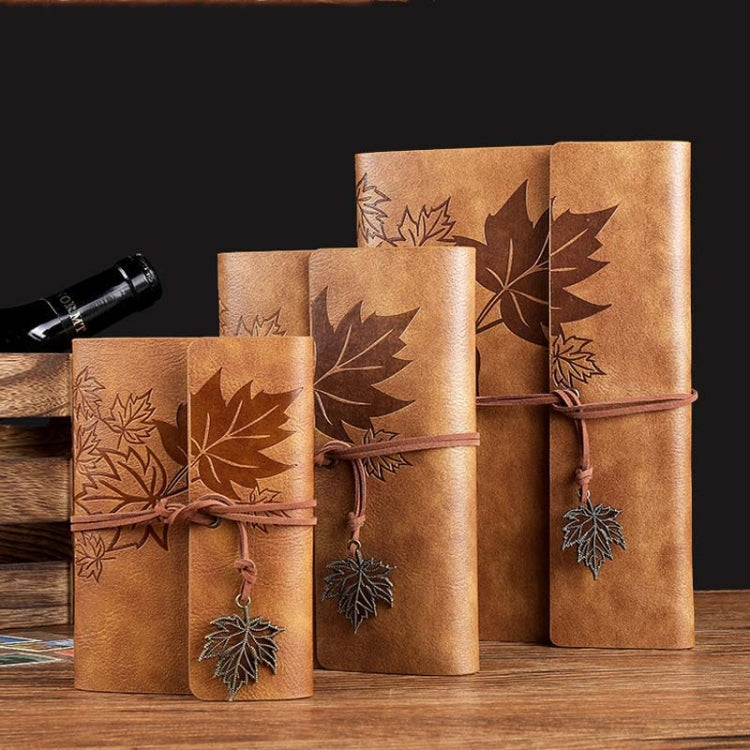 A5 PU Maple Retro Straps Handbook Loose-leaf Notebook in light blue with a copper maple leaf pendant and stylish strap.