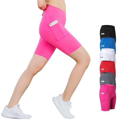 A pair of stretchable All Seasons Yoga Shorts in vibrant colors, featuring an elastic waistband and a convenient phone pocket.