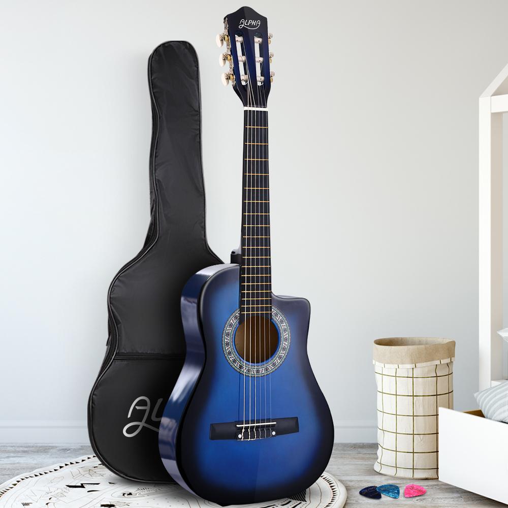 Alpha 34-inch Classical Acoustic Guitar in blue with a sleek finish, ideal for kids and beginners, displayed with accessories.