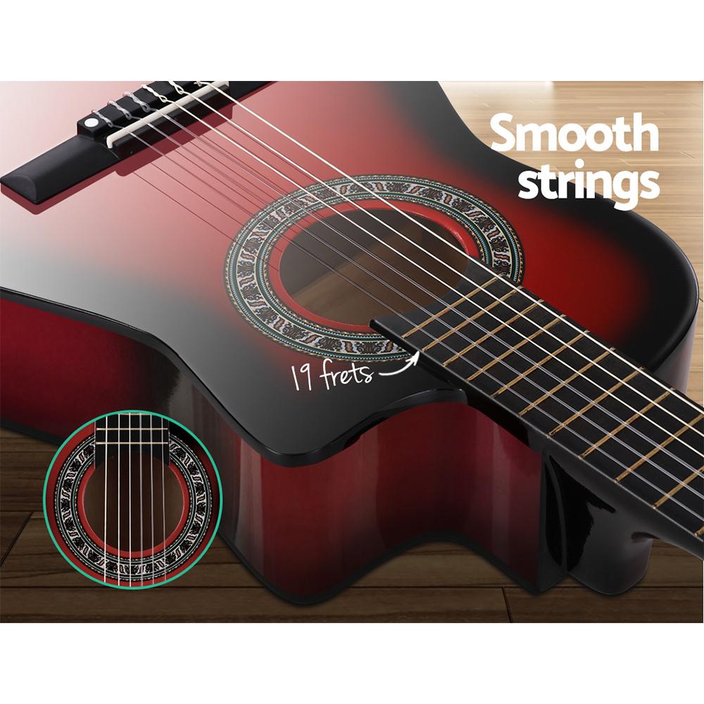 Alpha 34-inch Classical Acoustic Guitar in red with accessories including picks, tuner, capo, and carry bag.