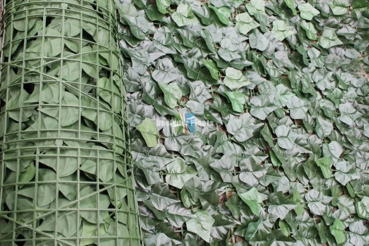 A roll of Artificial Ivy Leaf Hedging measuring 3m x 1m, showcasing lush green leaves ideal for privacy and decoration.