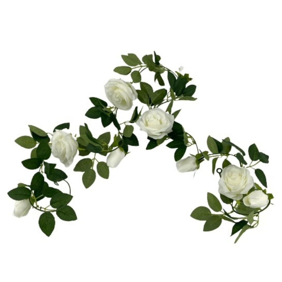 A 190cm long artificial white rose garland featuring realistic roses and lush green leaves, perfect for home and event decoration.