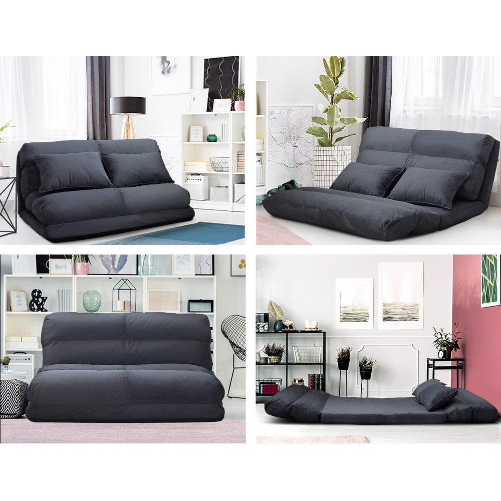 Artiss Lounge Sofa Bed in charcoal color, showcasing adjustable positions and two matching pillows.