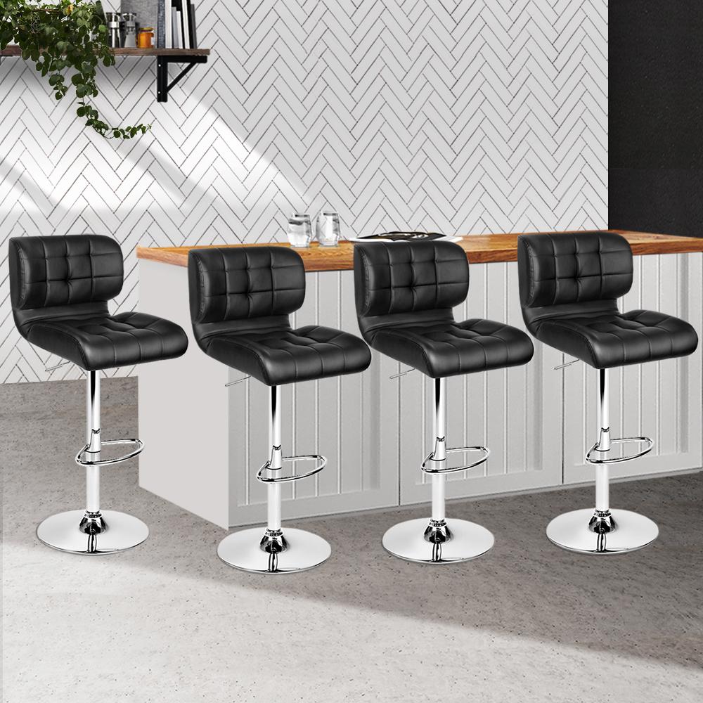 Artiss Set of 4 PU Leather Gas Lift Bar Stools in Black with Chrome Base, showcasing plush seats and adjustable height features.