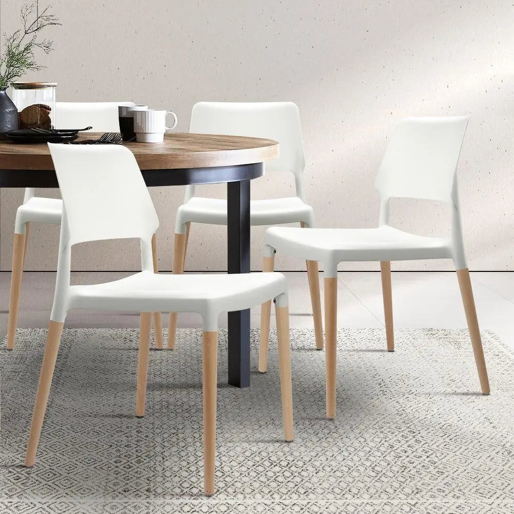 Artiss Set of 4 Wooden Stackable Dining Chairs in White with solid beech wood legs and comfortable PP plastic seats.