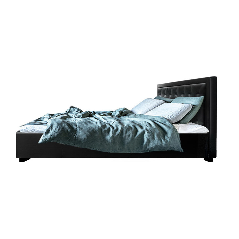 Artiss Tiyo Bed Frame in black PU leather with gas lift storage, featuring a tufted headboard and wooden slat base.