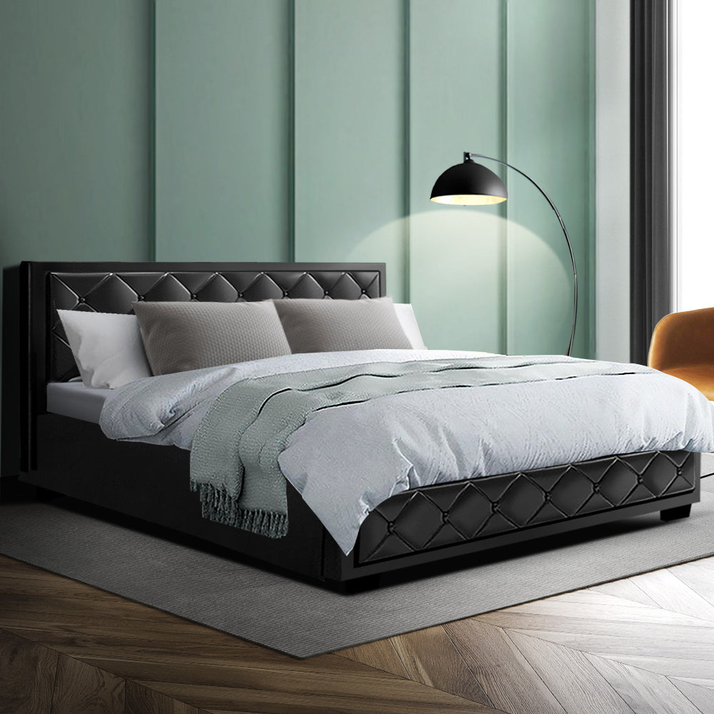 Artiss Tiyo Bed Frame in black PU leather with gas lift storage, featuring a tufted headboard and wooden slat base.