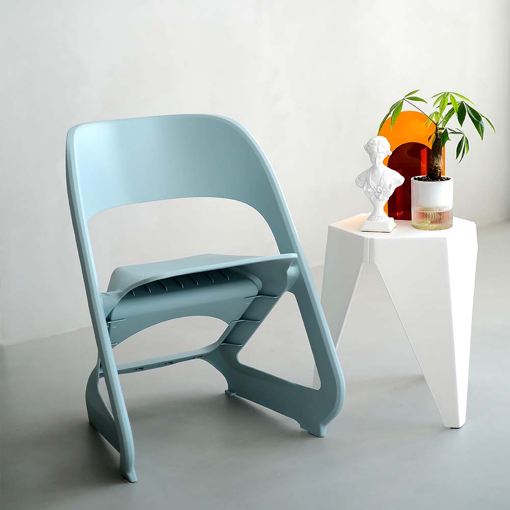 ArtissIn Set of 4 stackable dining chairs in vibrant blue, showcasing their sculpted design and modern aesthetic.