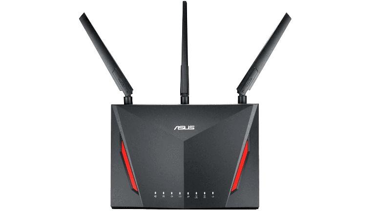 ASUS RT-AC86U AC2900 Dual Band Gigabit WiFi Gaming Router with antennas and sleek design.