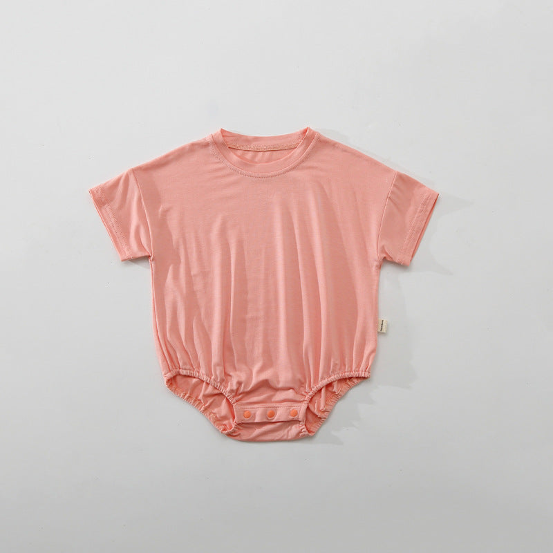 Baby unisex solid color rompers in various colors including pink, blue, green, and yellow, made from soft cotton blend fabric.