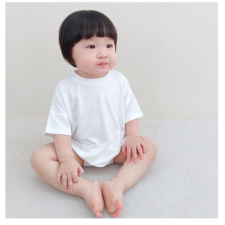 Baby unisex solid color rompers in various colors including pink, blue, green, and yellow, made from soft cotton blend fabric.