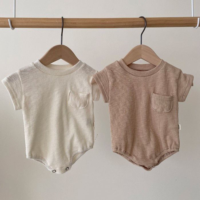 Baby unisex solid color rompers in white and coffee, made from soft cotton blend fabric, suitable for infants aged 0-24 months.