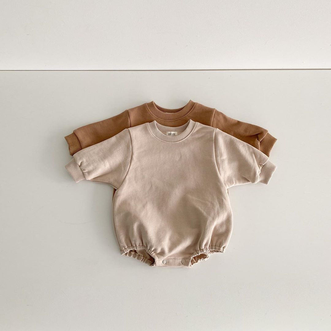 Baby unisex solid color rompers in beige and coffee, made from a soft cotton blend, suitable for boys and girls aged 3-18 months.