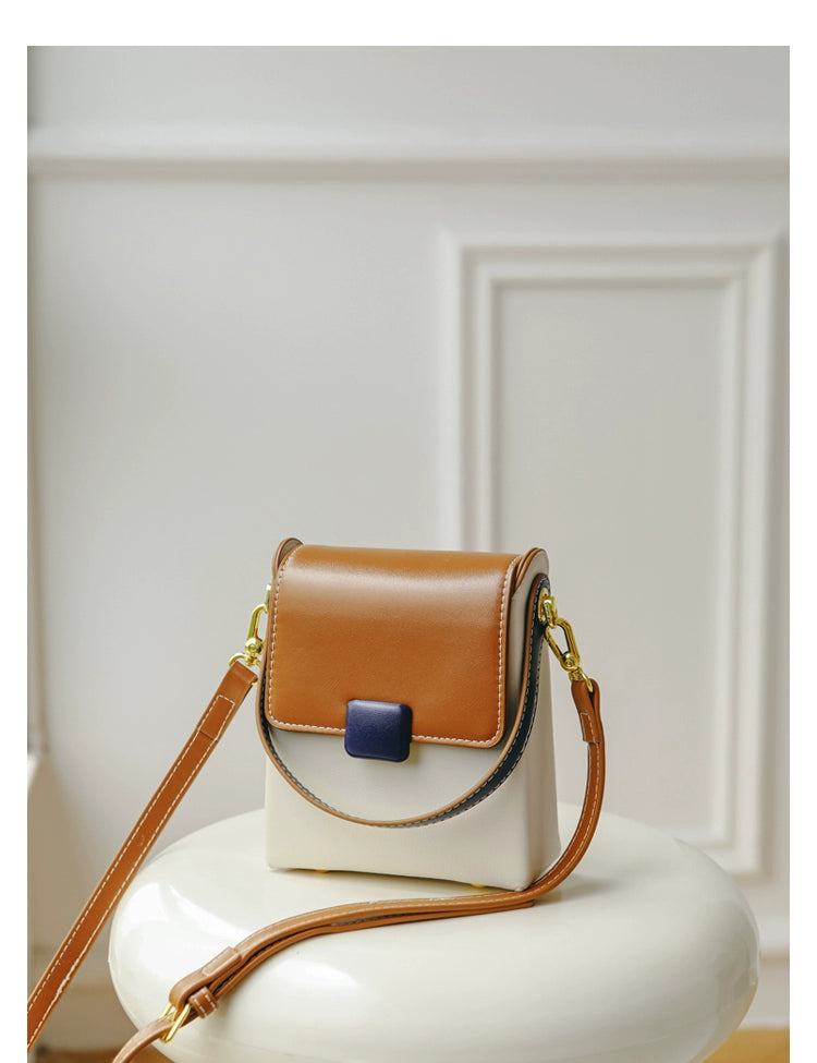 Stylish contrast color crossbody phone bag for women, featuring a unique special-interest design and adjustable strap.