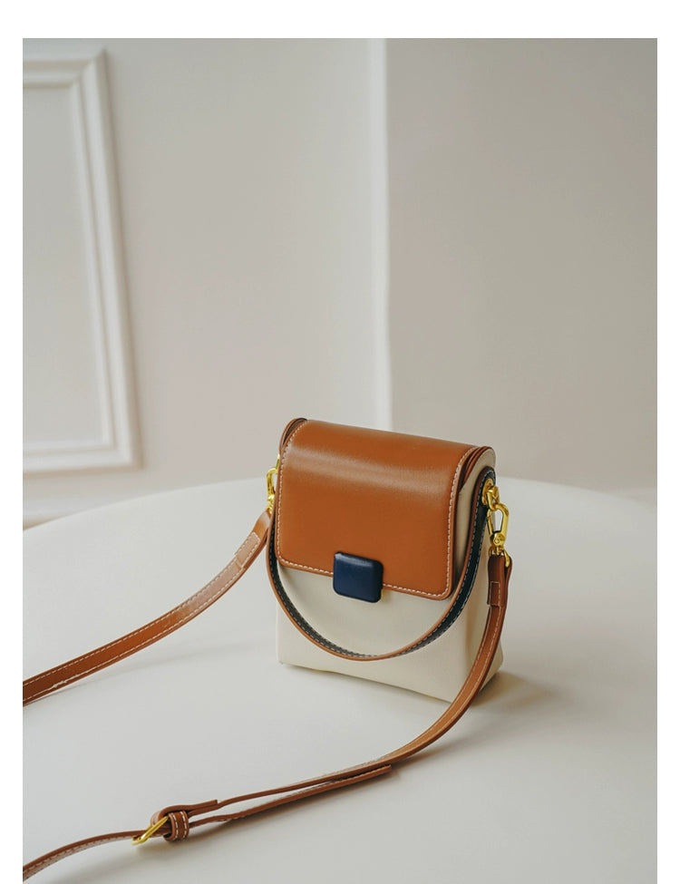 Stylish contrast color crossbody phone bag for women, featuring a unique special-interest design and adjustable strap.