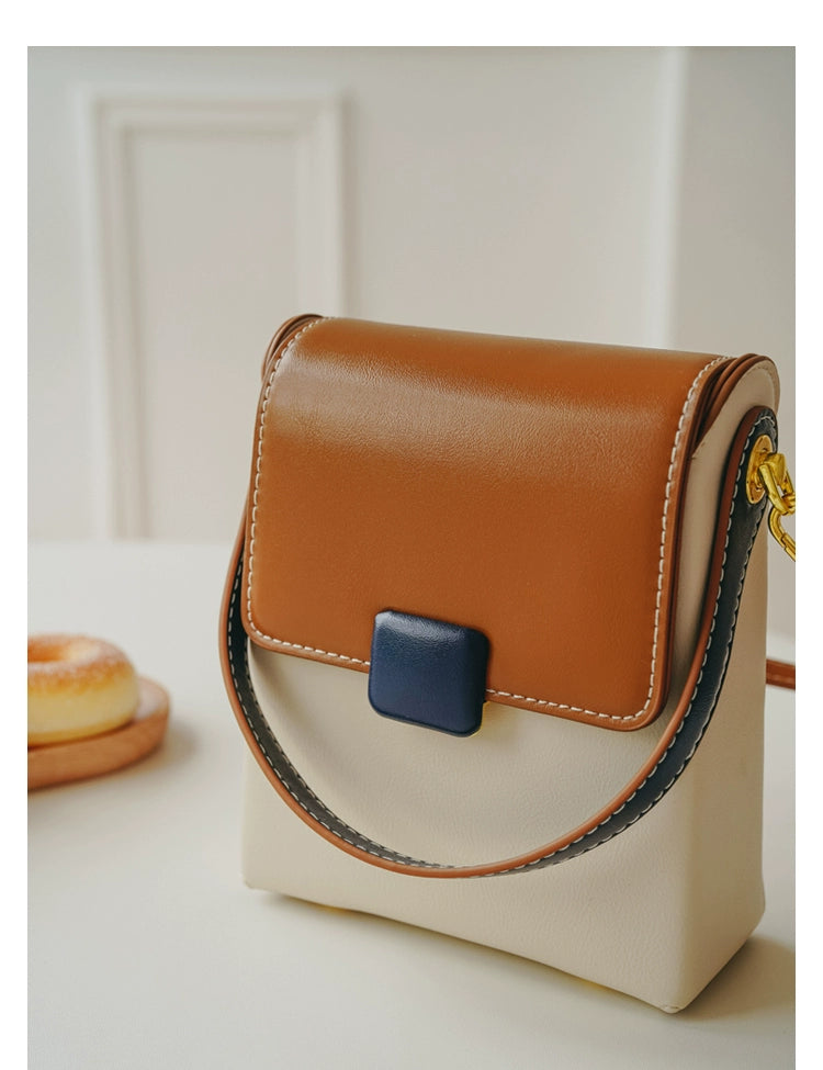 Stylish contrast color crossbody phone bag for women, featuring a unique special-interest design and adjustable strap.