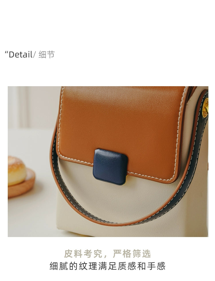 Stylish contrast color crossbody phone bag for women, featuring a unique special-interest design and adjustable strap.