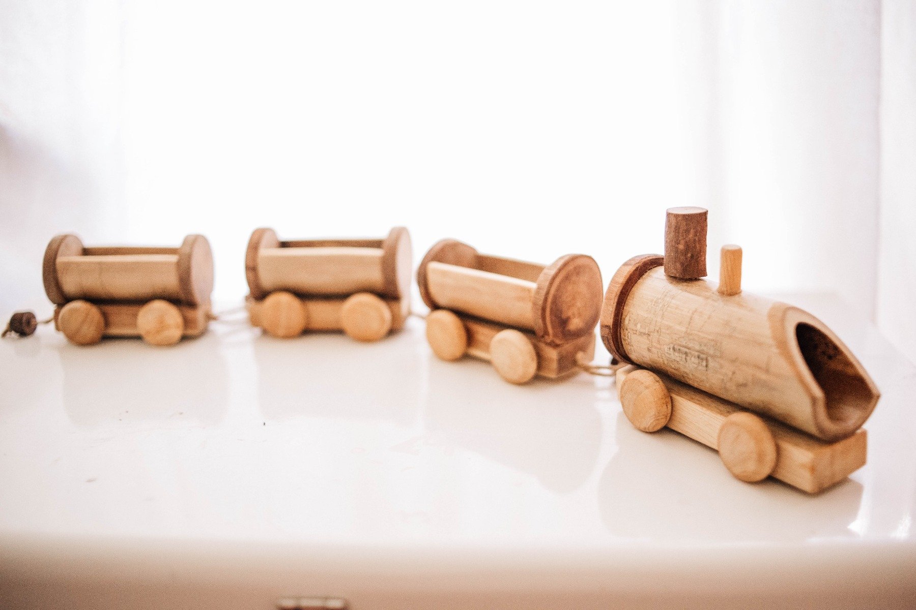 A charming Bamboo Train toy made from eco-friendly bamboo, showcasing its natural finish and lightweight design.