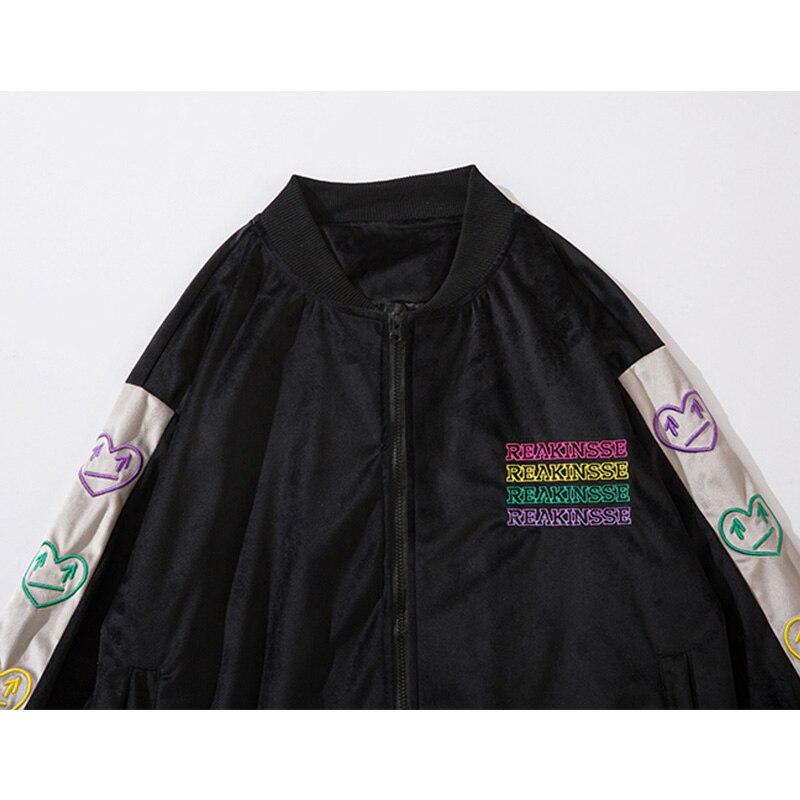 Men's colorful heart embroidered baseball jacket with patchwork design, featuring a zipper closure and ribbed cuffs.