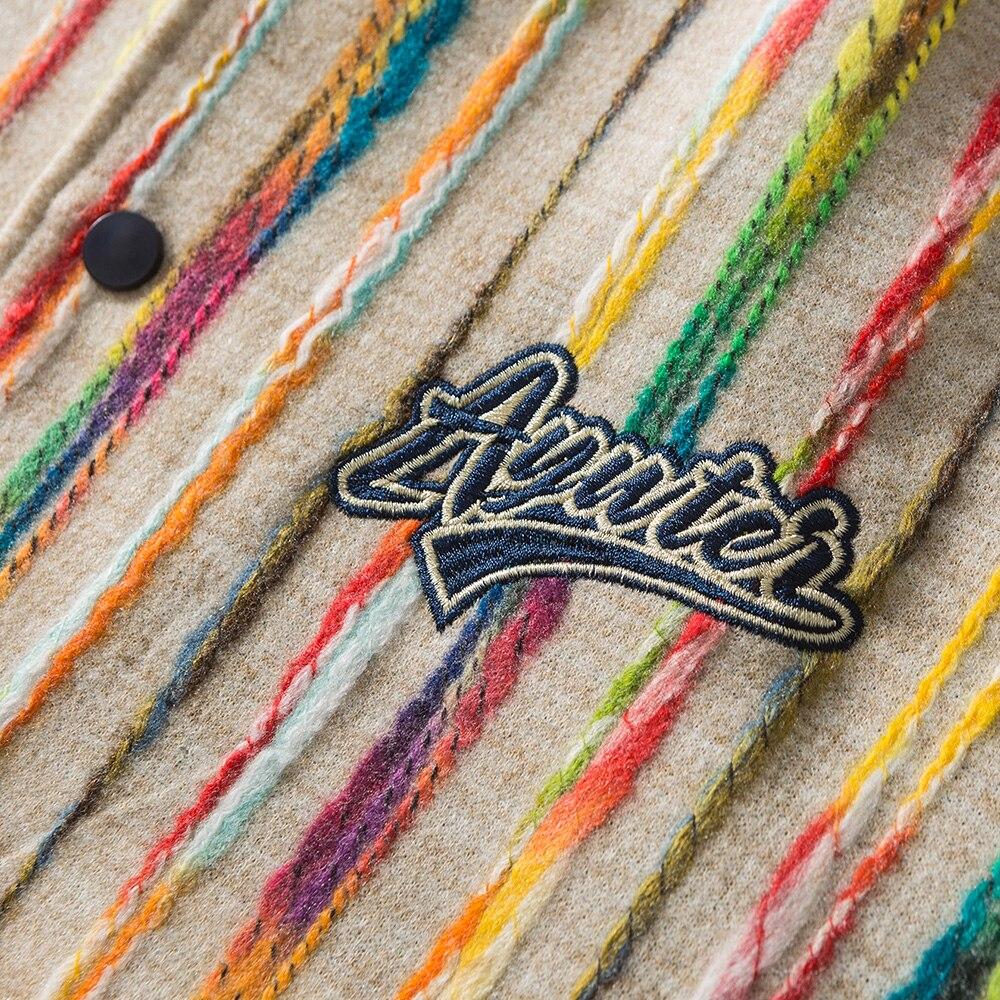 Men's baseball jacket featuring colorful knitted stripes and letter embroidery, perfect for streetwear and hip hop style.