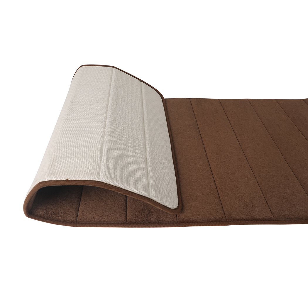 Thick and soft anti-slip bathroom shower mat in coffee color, featuring coral fleece surface and memory foam interlayer for comfort and safety.