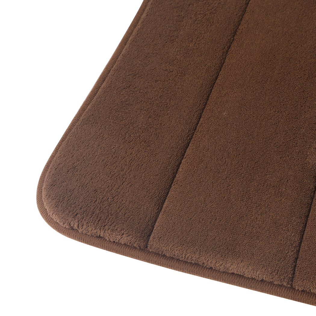 Thick and soft anti-slip bathroom shower mat in coffee color, featuring coral fleece surface and memory foam interlayer for comfort and safety.