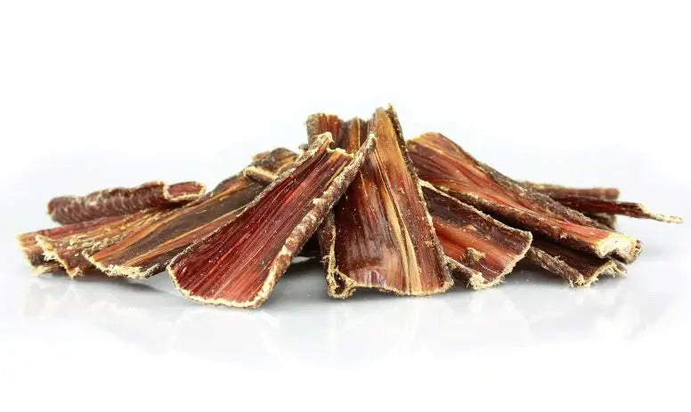 A pack of organic natural beef jerky dog treats, showcasing the chewy texture and rich color of the beef.