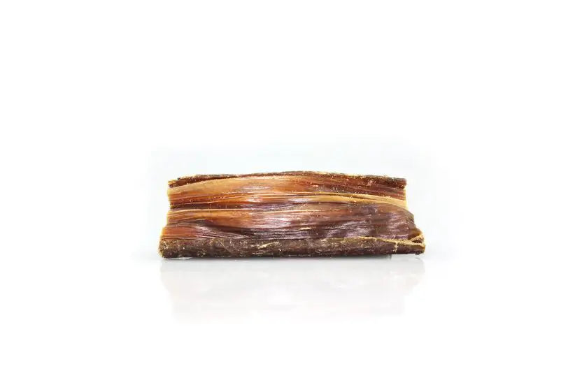 A pack of organic natural beef jerky dog treats, showcasing the chewy texture and rich color of the beef.