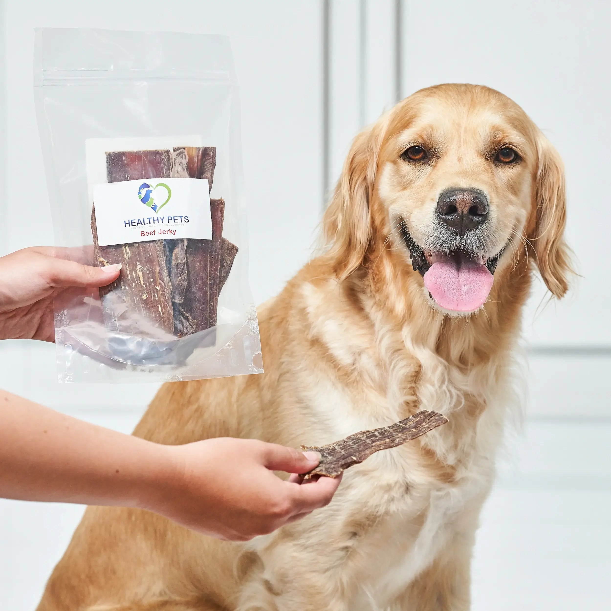 A pack of organic natural beef jerky dog treats, showcasing the chewy texture and rich color of the beef.