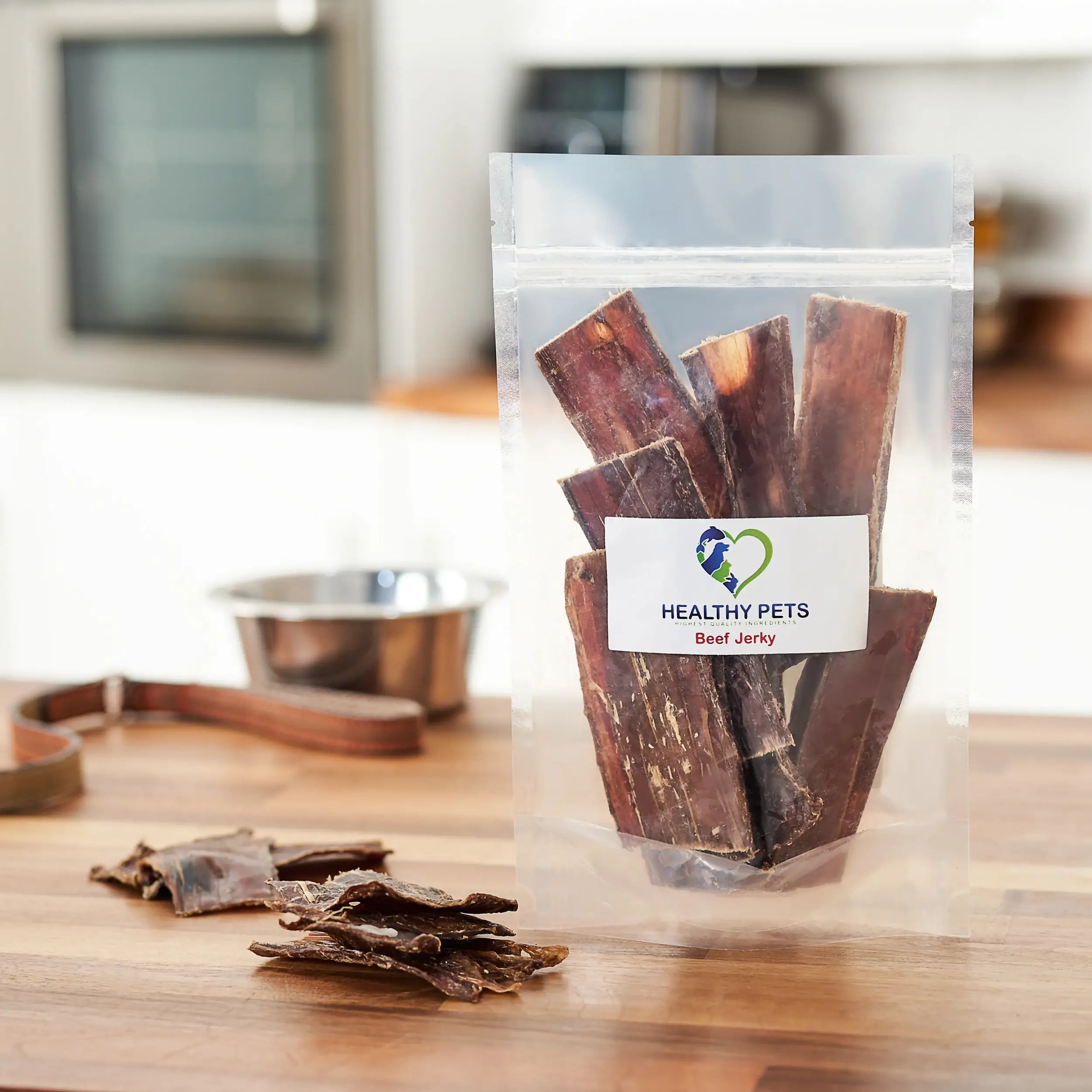 A pack of organic natural beef jerky dog treats, showcasing the chewy texture and rich color of the beef.