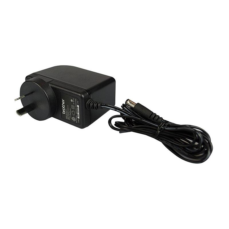 BROTHER PT Adaptor for Brother printers, featuring a compact design and reliable power connection.