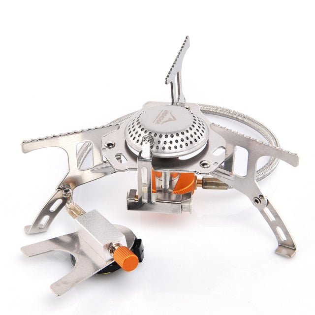 Camping gas burner outdoor stove made of stainless steel, designed for BBQs and picnics, featuring an ignition device and compact structure.