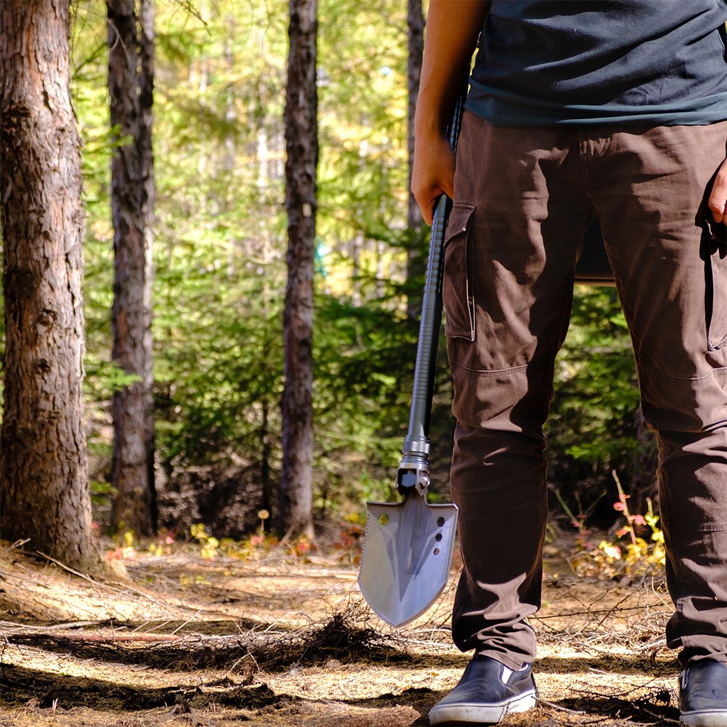 A multifunctional camping shovel with a folding design, made of manganese carbon steel and aluminum alloy, featuring various attachments for outdoor survival.