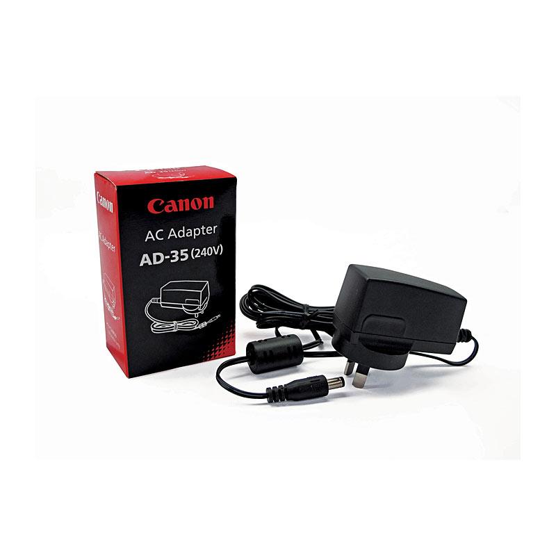 CANON AD35 Calculator Adaptor with a sleek design, suitable for various Canon calculators.