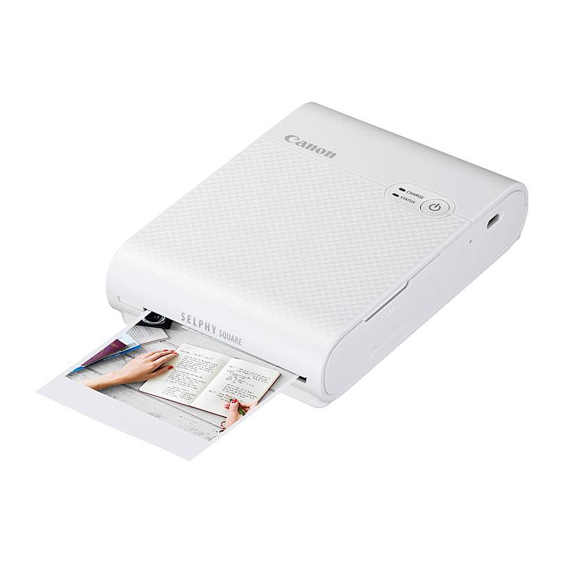 CANON Selphy QX10 White compact photo printer with sleek design and user-friendly interface.