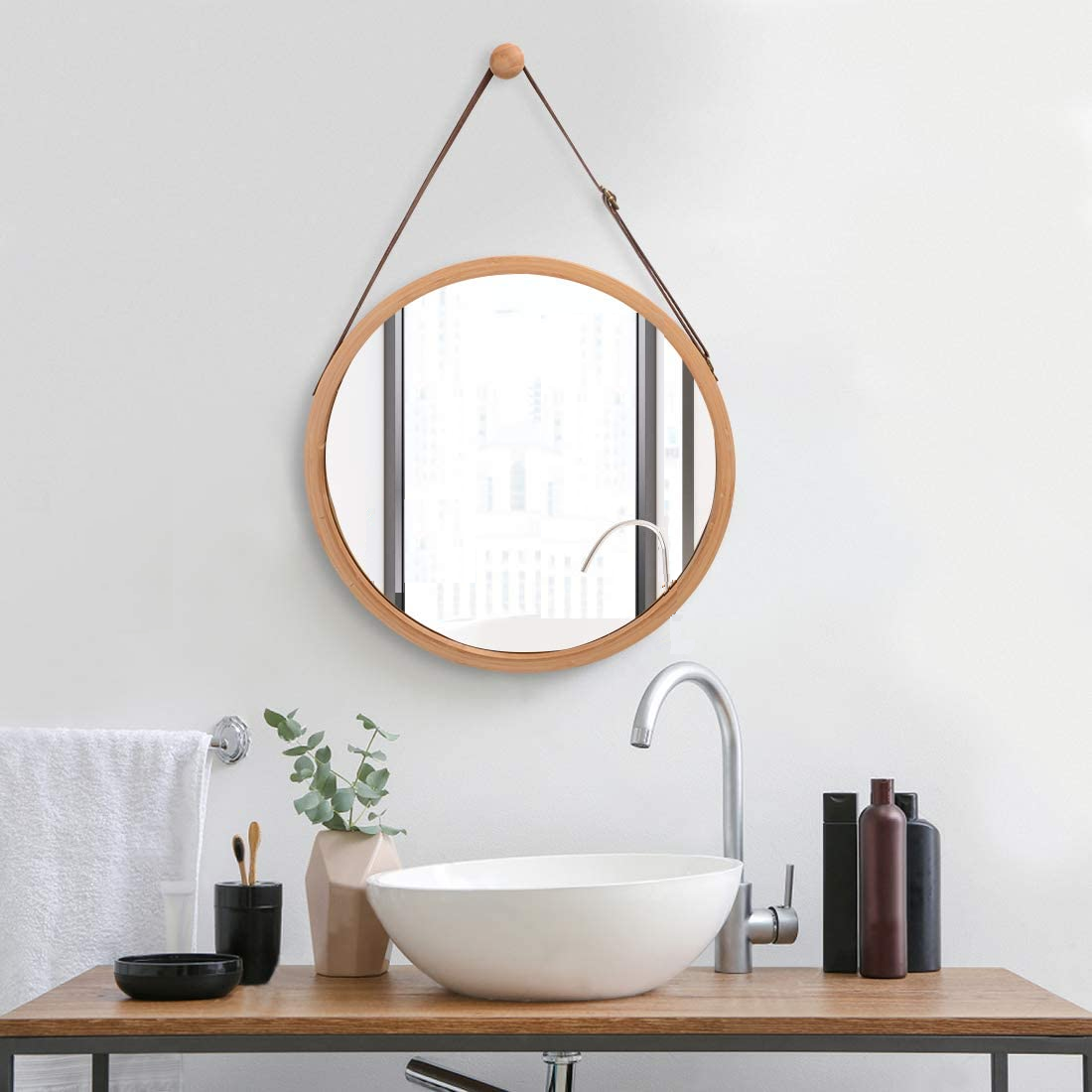 CARLA HOME Hanging Round Wall Mirror with a solid bamboo frame and adjustable leather strap, perfect for modern home decor.