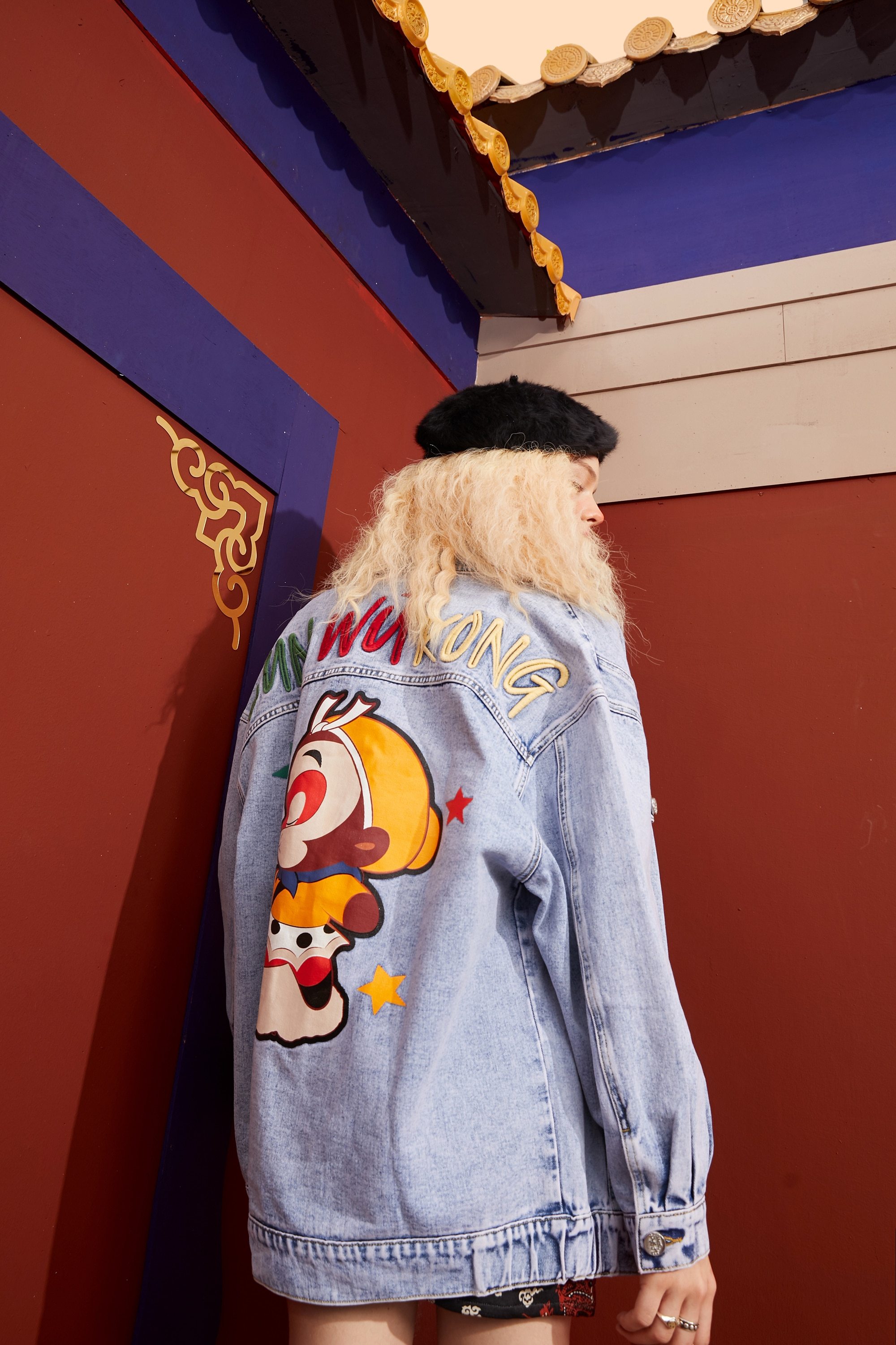 Oversized women denim jacket with cartoon print design, featuring a single-breasted closure and full sleeves, perfect for casual spring wear.