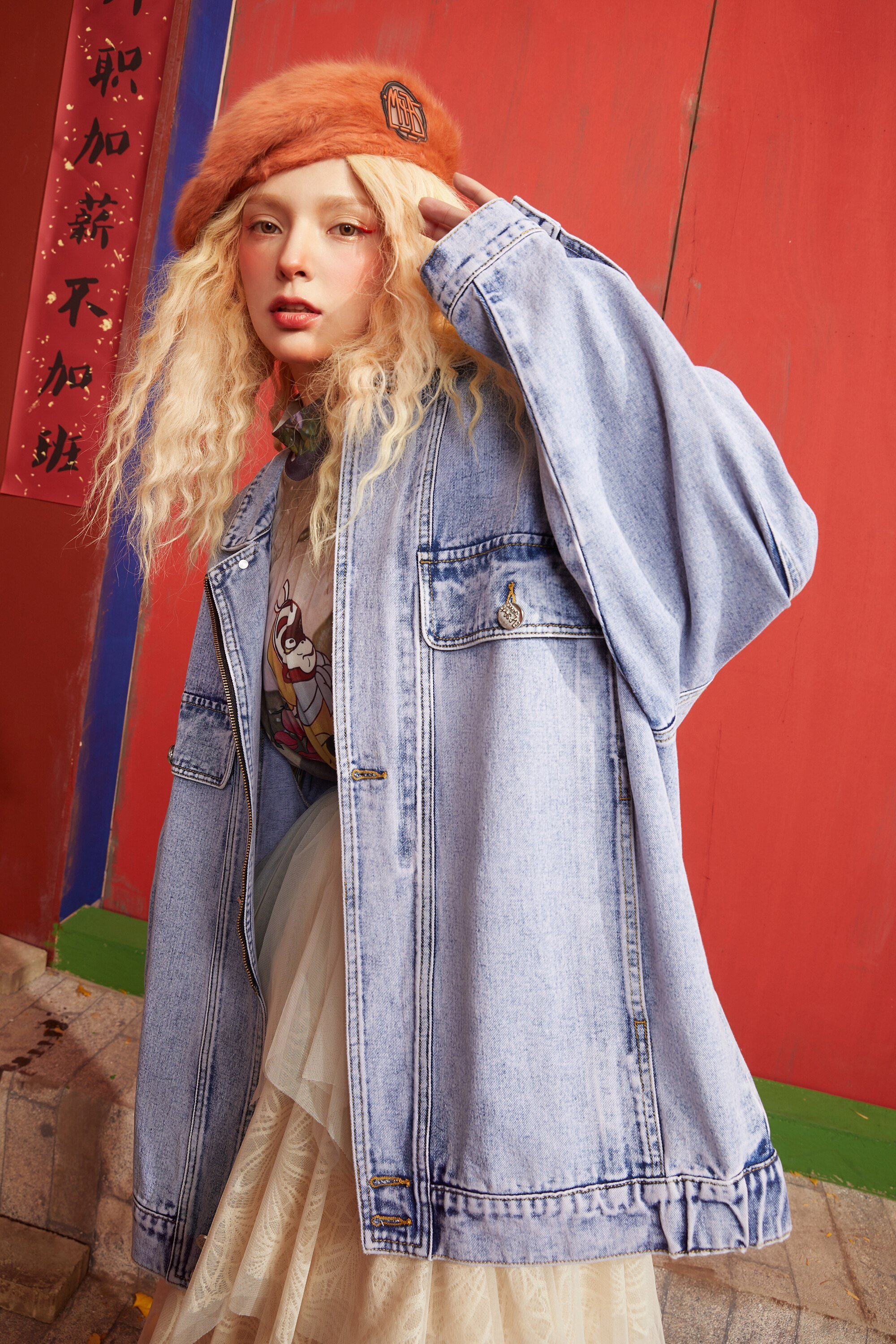 Oversized women denim jacket with cartoon print design, featuring a single-breasted closure and full sleeves, perfect for casual spring wear.