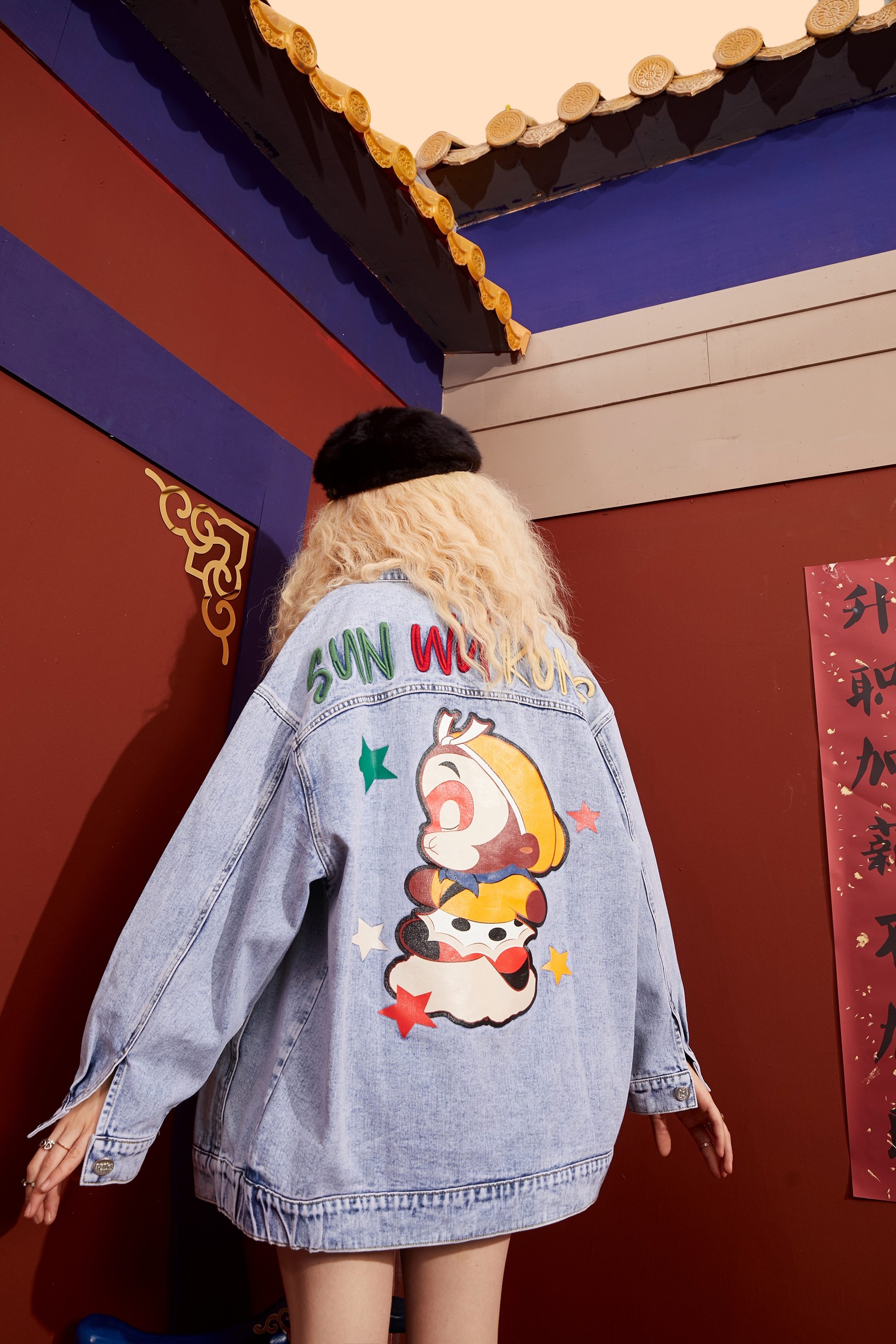 Oversized women denim jacket with cartoon print design, featuring a single-breasted closure and full sleeves, perfect for casual spring wear.