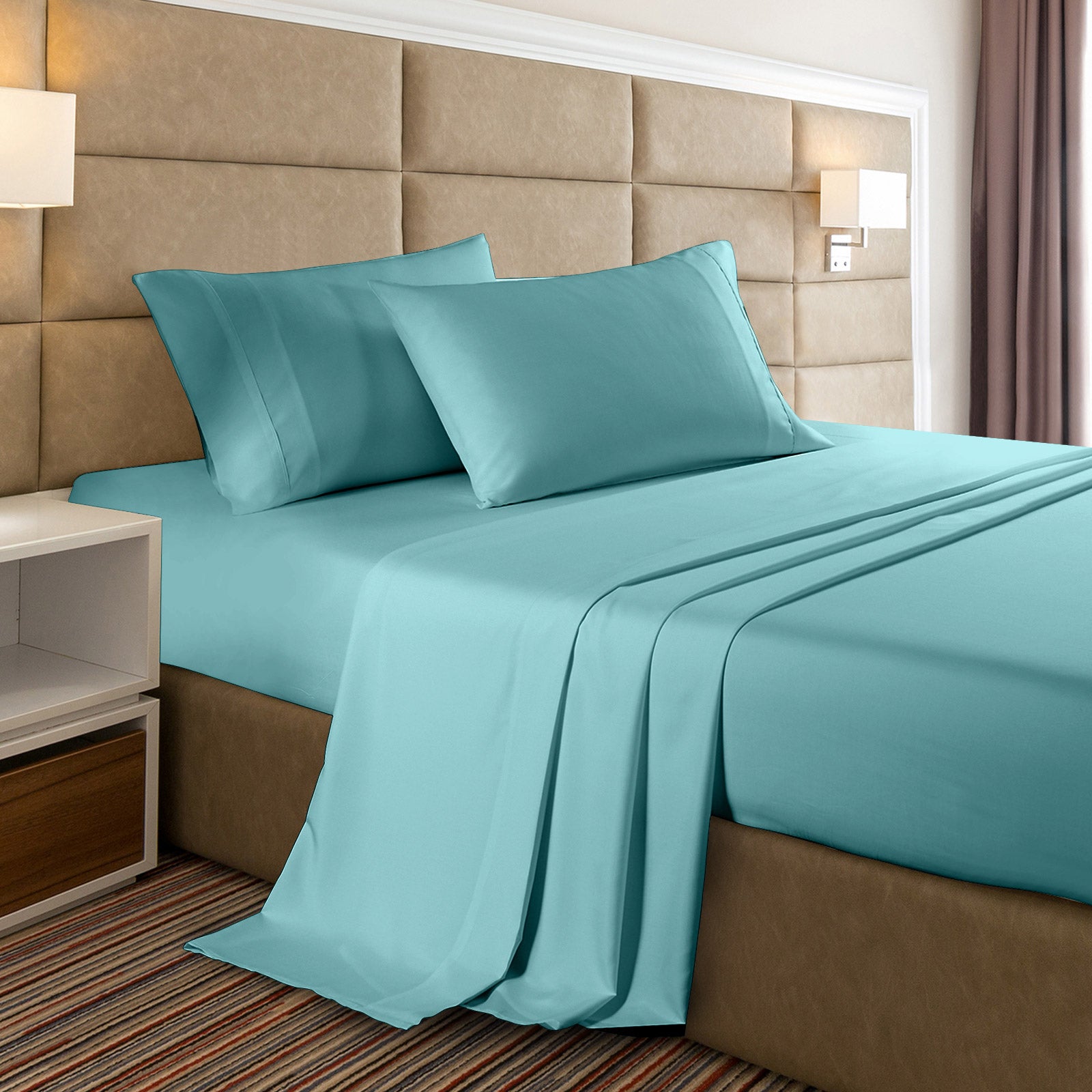 Casa Decor 2000 Thread Count Bamboo Cooling Sheet Set displayed on a bed, showcasing its luxurious texture and vibrant colors.