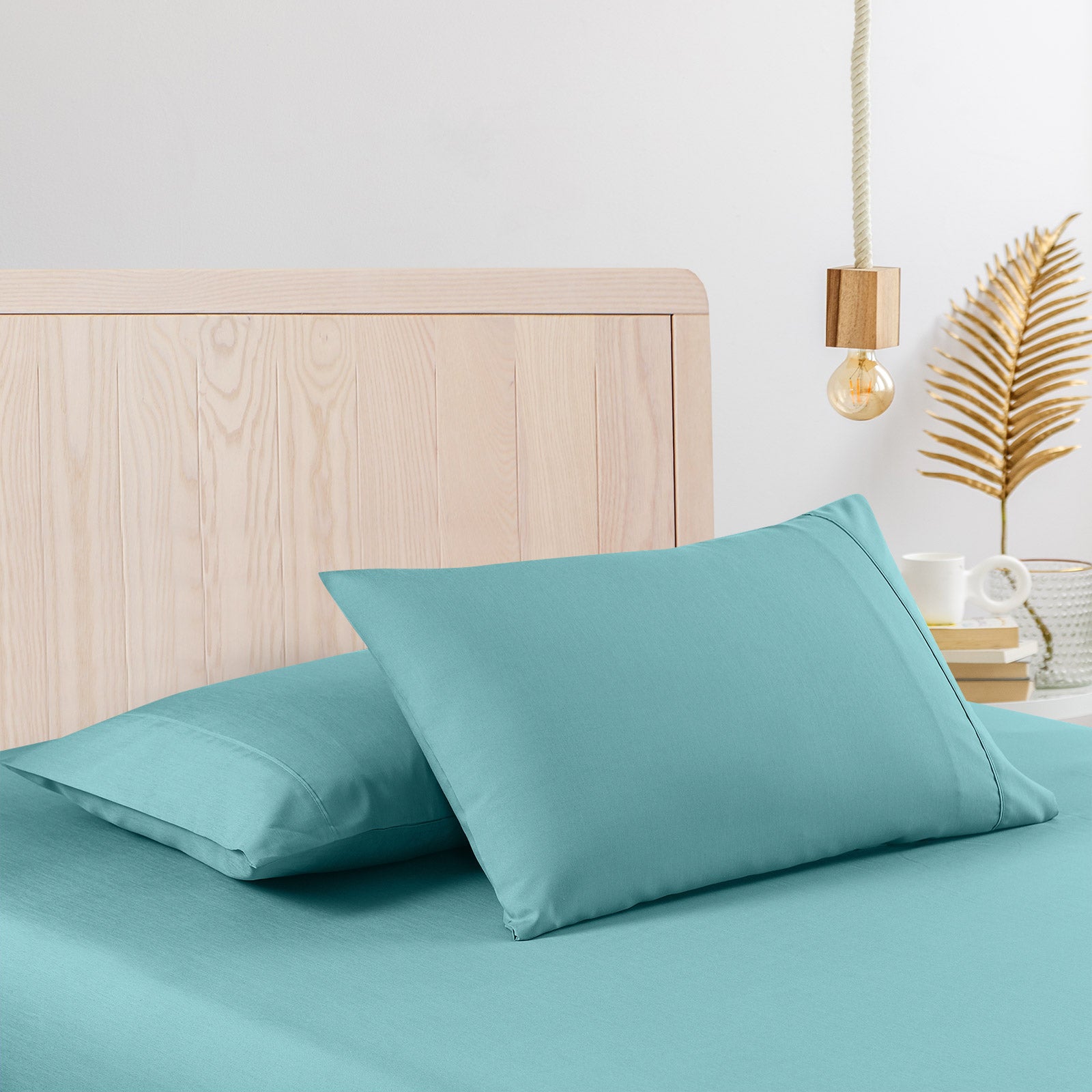 Casa Decor 2000 Thread Count Bamboo Cooling Sheet Set displayed on a bed, showcasing its luxurious texture and vibrant colors.