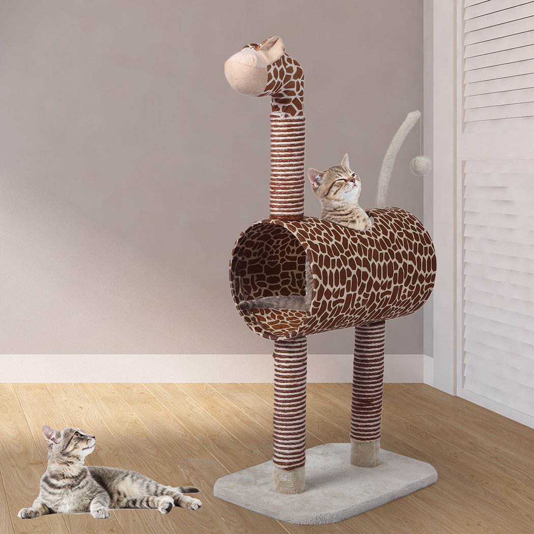 A beige multi-level cat tree tower with plush covering, featuring a sisal scratching post and hanging toys for playful cats.