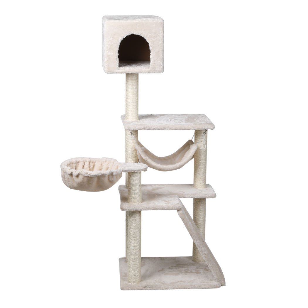 A beige multi-level cat tree tower with plush covering, sisal scratching posts, and hanging toys, designed for playful cats.