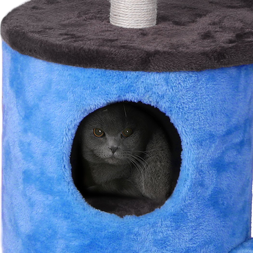 A multi-level cat tree tower with plush covering, sisal scratching post, and hanging toys, designed for playful cats.