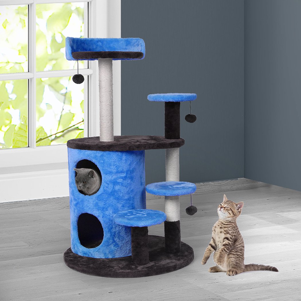 A multi-level cat tree tower with plush covering, sisal scratching post, and hanging toys, designed for playful cats.