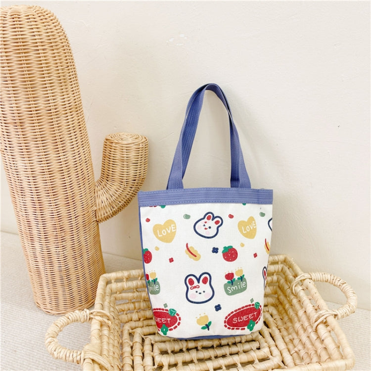 Children's cute cartoon canvas bag featuring vibrant colors and playful designs, perfect for carrying toys and snacks.